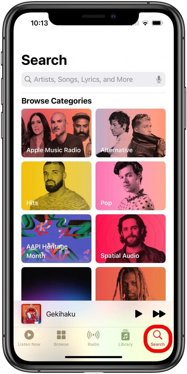 Apple Music app with Search button marked.