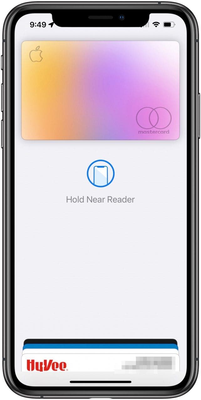 Apple Pay screen reading Hold Near Reader.