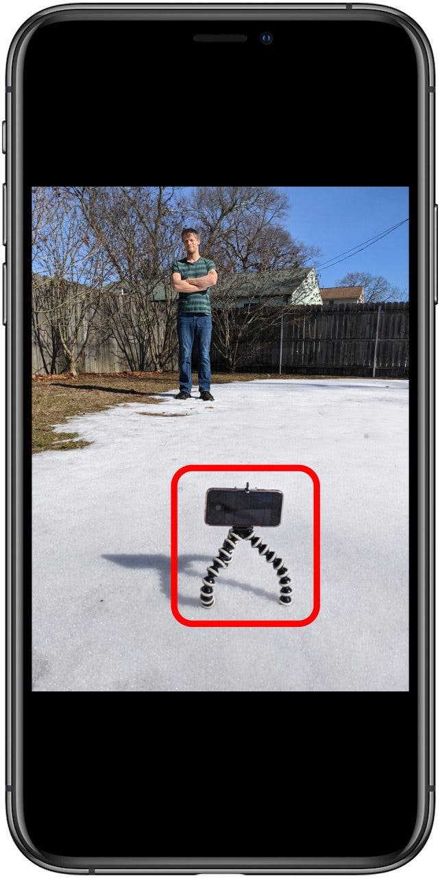 Position your phone on a tripod to take the photo.